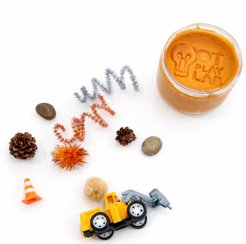 Construction-themed sensory playdough jar with fine motor tools, by OT Play Lab